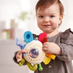 HABA Teether Cuddly Rainbow Round - Soft Activity Toy With Rattling & Teething Elements 13 HABA Teether Cuddly Rainbow Round - Soft Activity Toy With Rattling & Teething Elements -Chicco Kids Shop GUEST 176b8a0d 160d 4aef 92be f171f2922b92