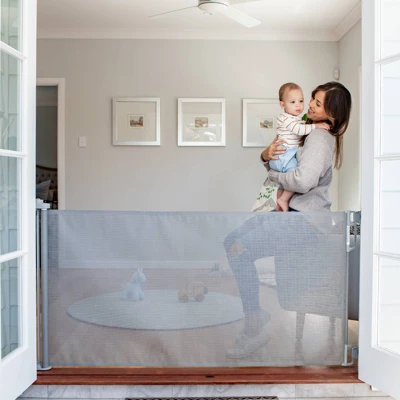 Perma Child Safety Outdoor Retractable Baby Gate 33" Tall, Extends To 71" Wide, Gray 1 Perma Child Safety Outdoor Retractable Baby Gate 33" Tall, Extends To 71" Wide, Gray